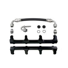 Load image into Gallery viewer, DeatschWerks Chevrolet LSA/LS9 fuel rails with crossover, black metal finish, mounted on a performance engine intake manifold