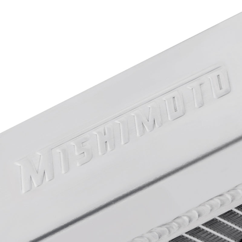 Mishimoto aluminum radiator for 1990-1996 Nissan 300ZX Turbo, showing the sleek, lightweight design with mounting fins and inlet/outlet ports.