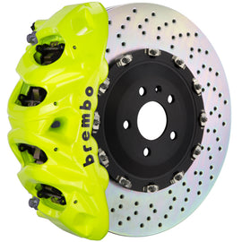 Brembo Corvette C8 rear GT BBK 6-piston cast drilled 380x34mm brake rotor in vibrant yellow for high-performance braking.