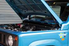 Load image into Gallery viewer, GReddy Engine Hood Lifter Kit 18+ Jimny JB64W (Designed for OEM weight hoods.)