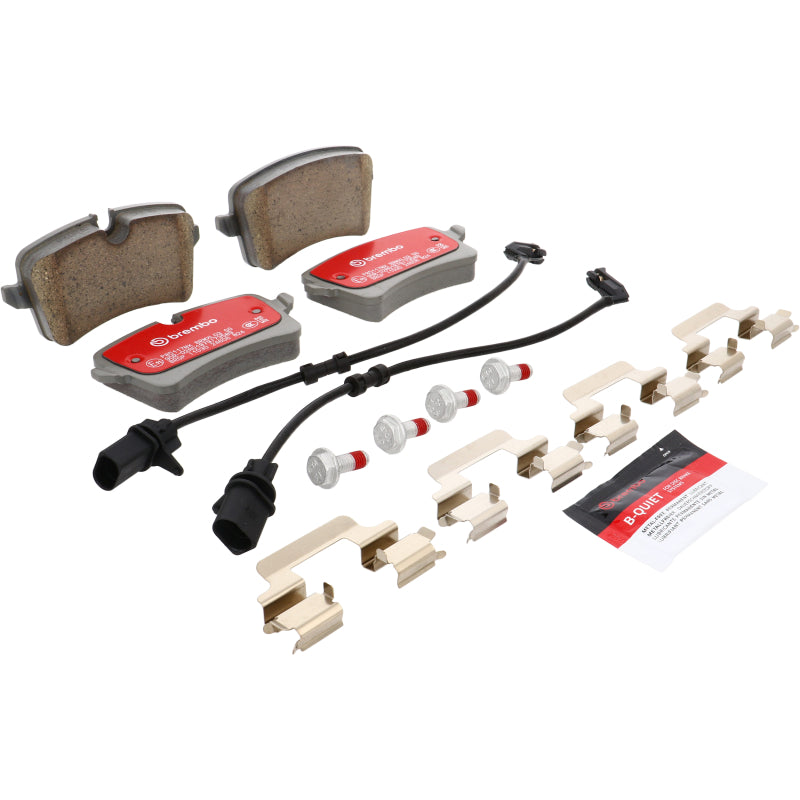 Brembo OE ceramic brake pads for Audi A4 B9 and A8 D4, rear view showing the brake pad assembly with Brembo branding.