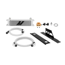 Load image into Gallery viewer, Mishimoto thermostatic oil cooler kit installed in a Subaru WRX/STi engine, showing the oil cooler and hoses.