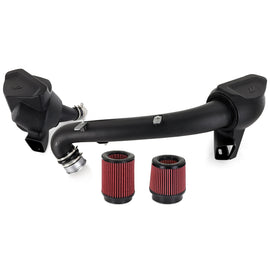 Mishimoto cold air intake kit installed in a 2021+ BMW G8X M3/M4, showing the sleek air filters and intake tubing.
