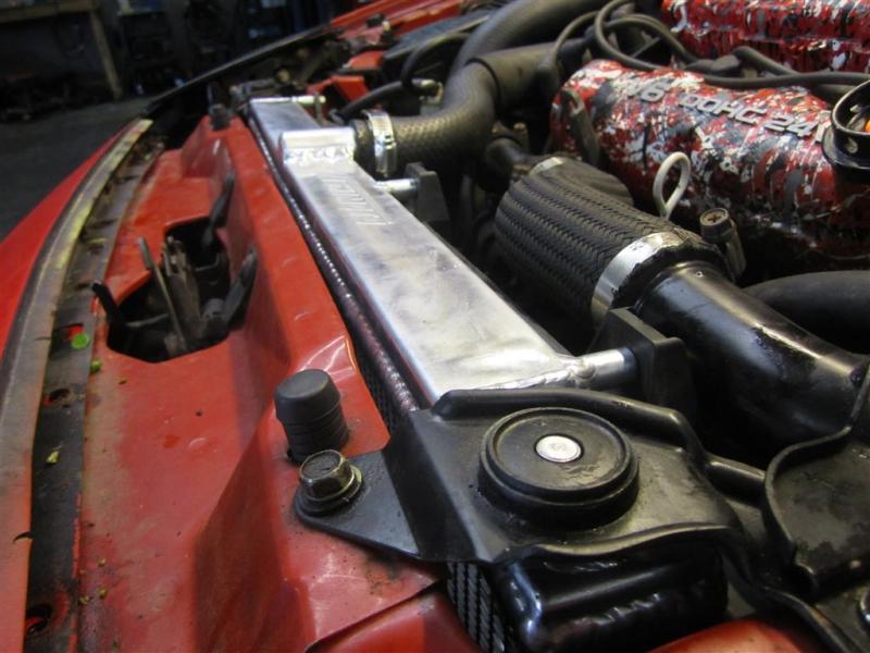 Mishimoto aluminum radiator for 1991-1999 Mitsubishi 3000GT Turbo manual transmission, showing the sleek, lightweight design.