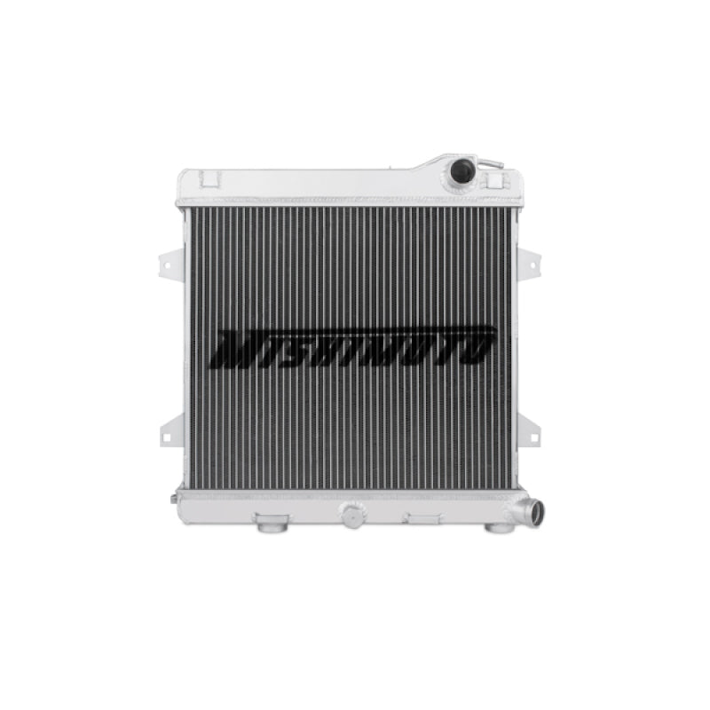Mishimoto aluminum radiator for BMW E30 M3 manual transmission, showcasing the sleek, lightweight design and cooling fins.