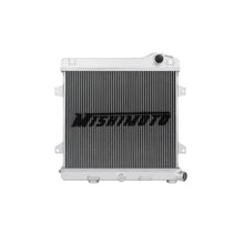 Load image into Gallery viewer, Mishimoto aluminum radiator for BMW E30 M3 manual transmission, showcasing the sleek, lightweight design and cooling fins.