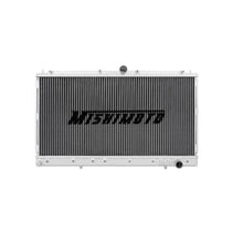 Load image into Gallery viewer, Mishimoto aluminum radiator for 1991-1999 Mitsubishi 3000GT Turbo, showing sleek silver design and core structure.