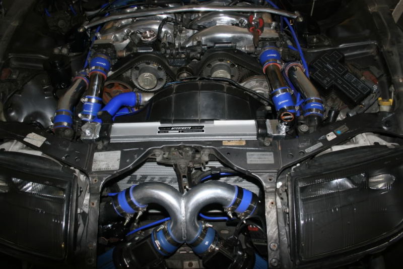 Mishimoto aluminum radiator for 1990-1996 Nissan 300ZX Turbo, manual transmission, with a sleek silver finish and core details.