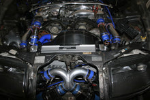 Load image into Gallery viewer, Mishimoto aluminum radiator for 1990-1996 Nissan 300ZX Turbo, manual transmission, with a sleek silver finish and core details.