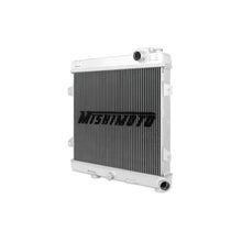 Load image into Gallery viewer, Mishimoto aluminum radiator for 87-91 BMW E30 M3, manual transmission, with core and end tanks visible in the image.