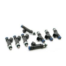 Load image into Gallery viewer, DeatschWerks LS1/LS6 Series fuel injector set for 85-04 V8 Mustang, 39lb injectors for 8-cylinder engines, shown in image.