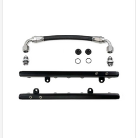 DeatschWerks Chevrolet LS2/LS3 fuel rails with crossover, metallic finish, detailed metal construction, designed for performance fuel delivery