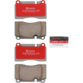 Brembo OE ceramic brake pads for Aston Martin DB9 and DBS Coupe, front or rear, shown installed on vehicle brake system.